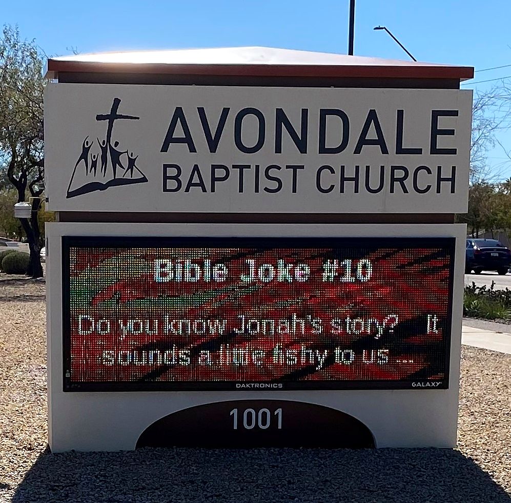 The Avondale Baptist Church sign with a Bible joke about Jonah on its screen